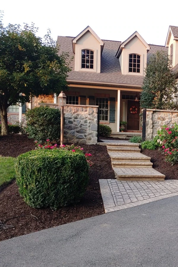 A beautiful landscaped front yard.